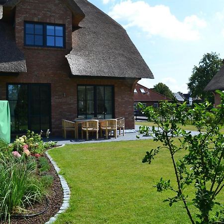 Вилла Reetdachhaus Nordstern Гардинг Экстерьер фото